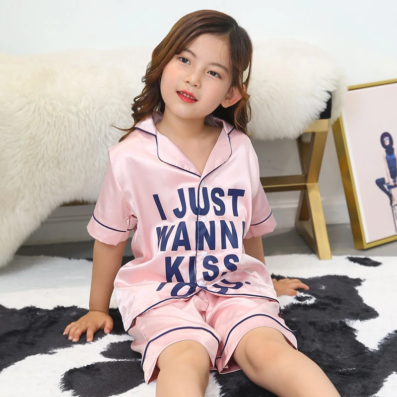 Meninas e meninos unissexo Kids Soft confortável Sleepwear sólido pijamas 2 Conjunto de PCS