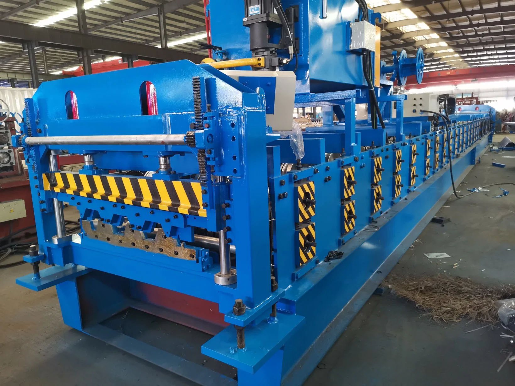 980 Shaped High Strength Bearing Steel Structure Floor Decking Cold Roll Forming Machine