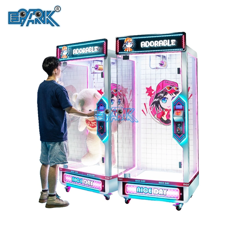 Machine de jeu d'arcade distributrice de cadeaux fonctionnant avec des pièces de monnaie pour couper des prix d'équipement de divertissement.