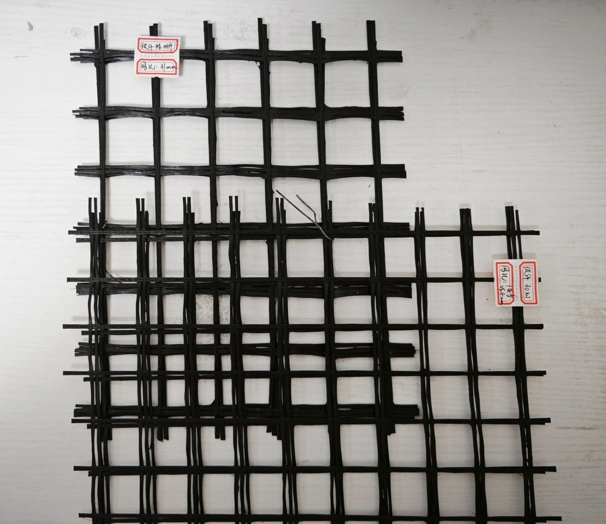 Chuangwan 100kn/M Fiber Glass Geo Grid for Road Construction