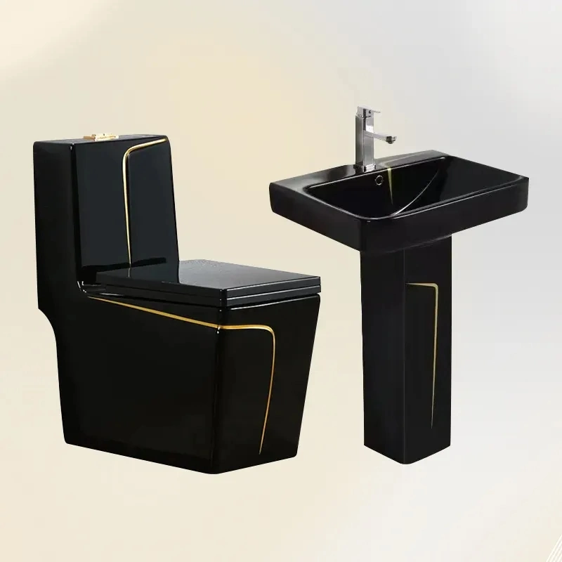 Toilettes en céramique de luxe noir et or pour salle de bains moderne avec lavabo assorti.