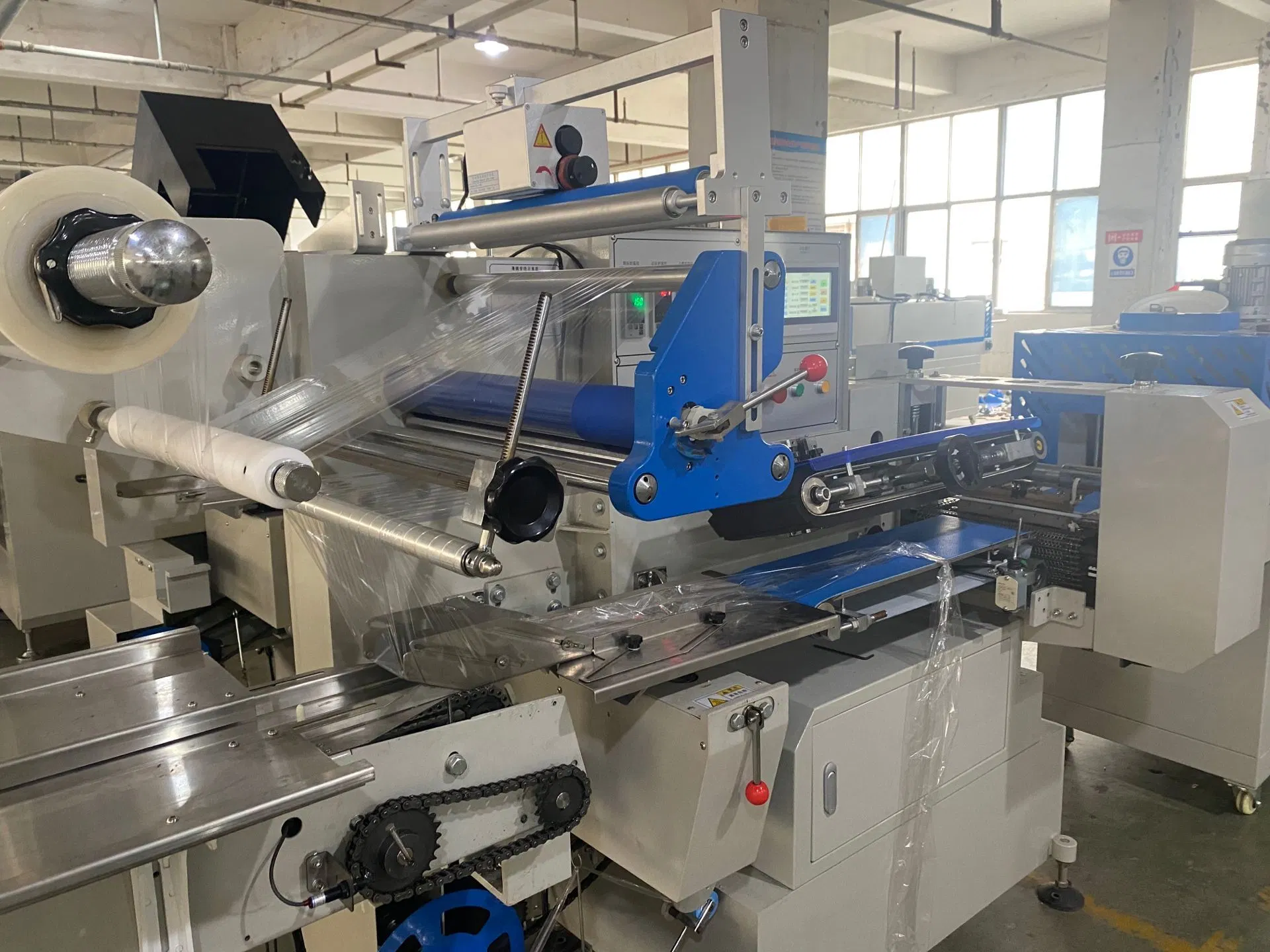 Automatic Flap Disc L Style Staples Stacking Shrink Wrapping Packaging Machine Thermal Heat Automatic POF PVC Film L Bar Sealing Shrink Wrapping Packaging