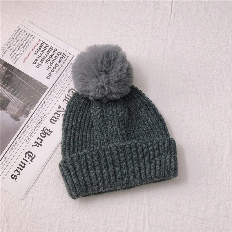 Precio al por mayor mujeres Invierno caliente POM POM gorro de gorro