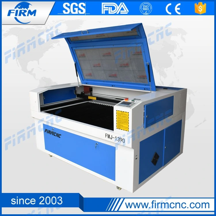 Jinan Venta 1300*900mm precio de fábrica cortadora y grabadora láser de CO2