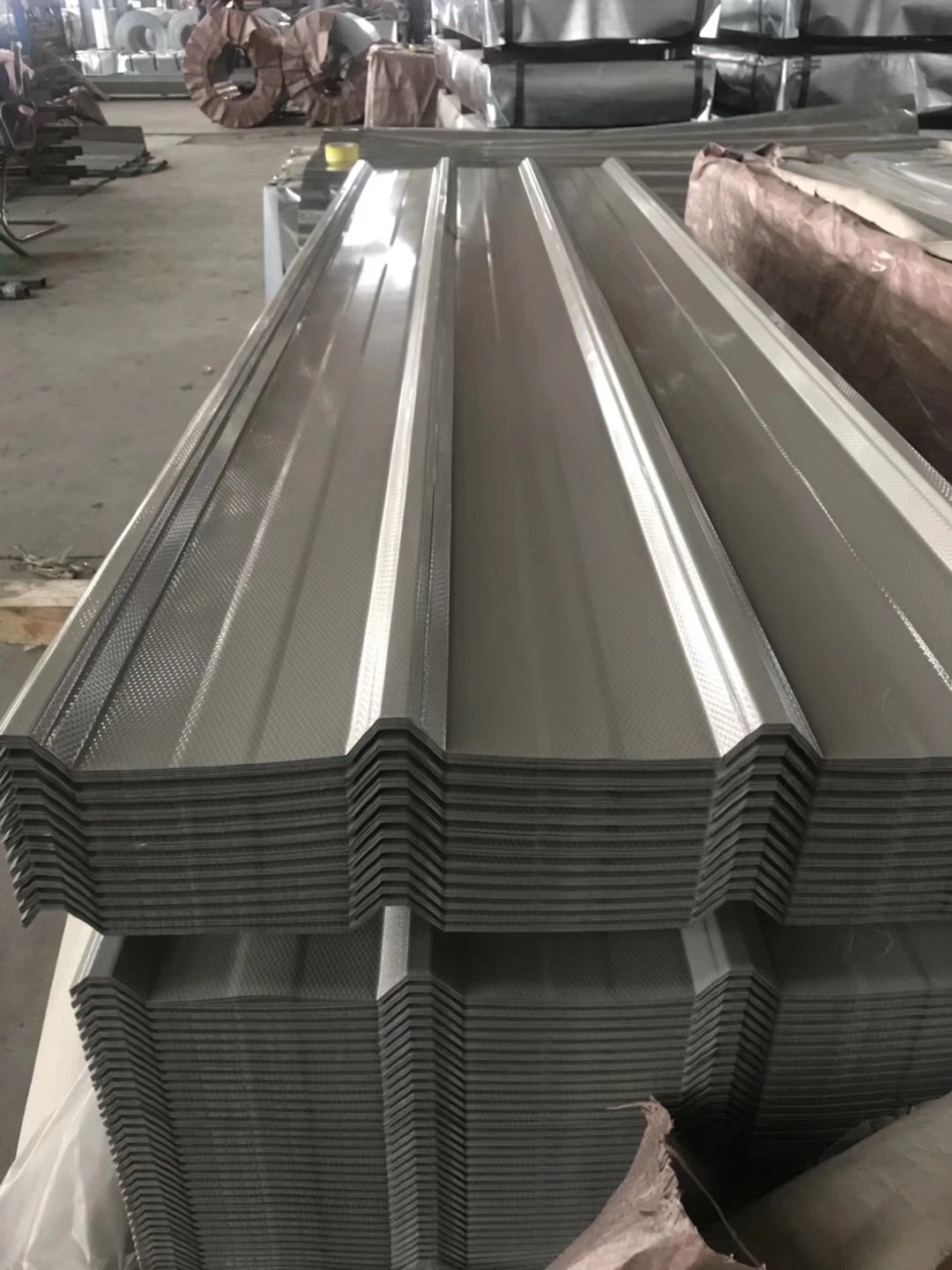 Los productos de acero plano recubiertos de alta calidad cumplen con los estándares magnesio de aluminio Bobina de zinc de envío rápido chapada