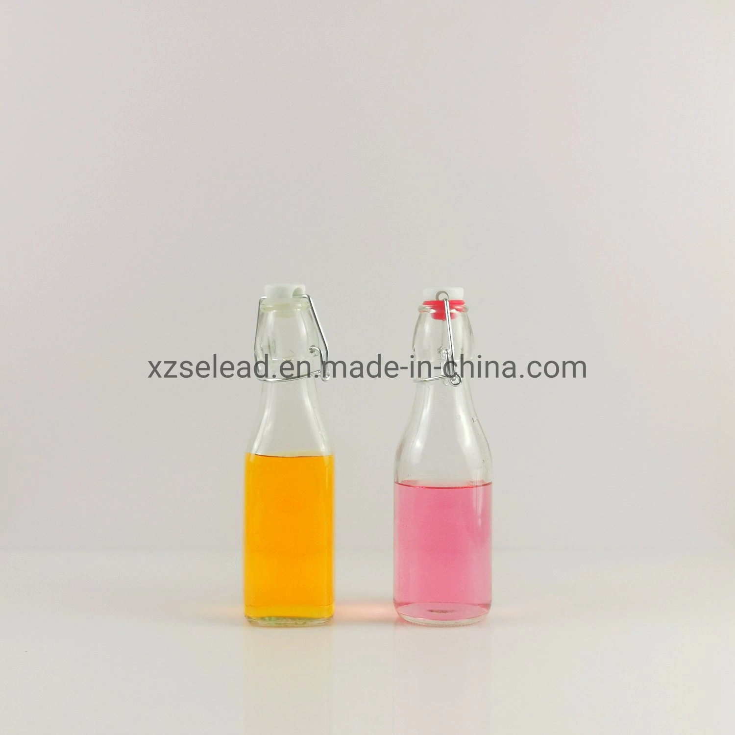 Soft Drinks Glass Beverage Bottle Customized Glass Packing with Flip Stopper 250ml 750ml 32oz