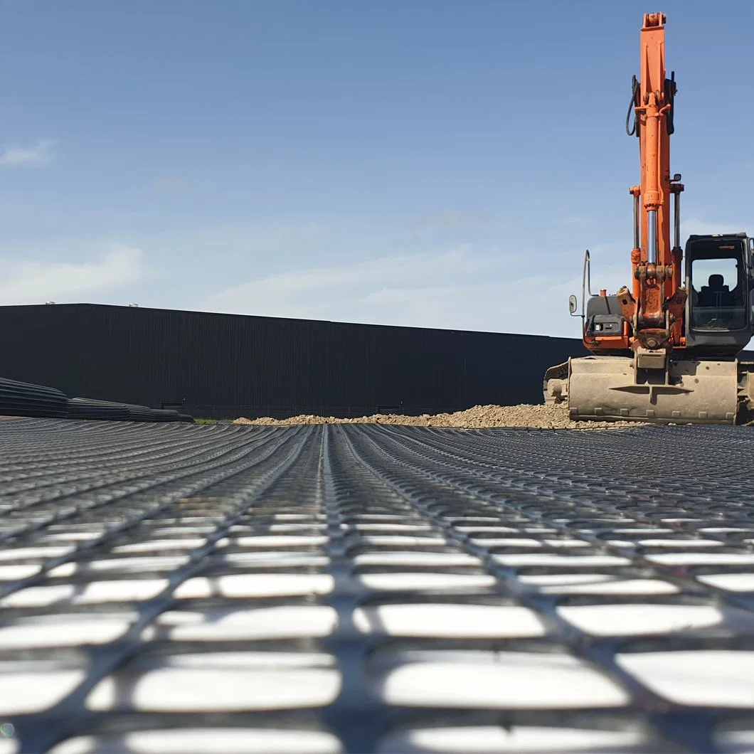 PP بوليبروبيلين البلاستيك Biaxial Geogrid Tgsg 40-40 الطريق تعزيز Biaxial Geogrid Geosynthetics Soft التربة الناعمة قاعدة الطريق مع الحفاظ على الحماية من الانحدار على الجدار