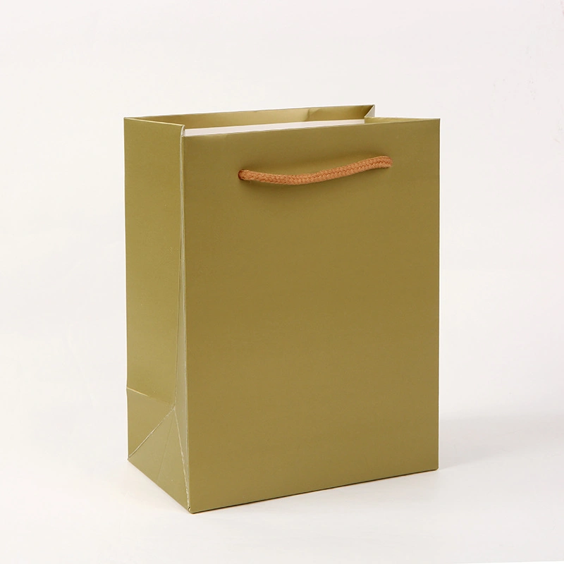 Comercio al por mayor bolsas de regalo papel sencillo cajas de caramelos de papel Kraft con asas Boda Fiesta de cumpleaños personalizadas Embalaje de regalo