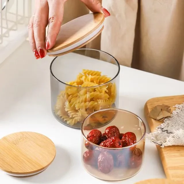 Ensemble de bocaux de rangement en verre borosilicate haut de gamme pour aliments et fruits avec couvercle en bambou pour la cuisine.