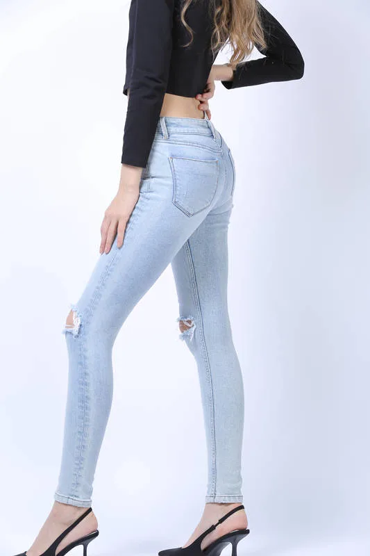 Moda mujeres Jeans OEM Niza enzima Ripper lavado skinny Fit Jeans denim para mujer de color azul claro