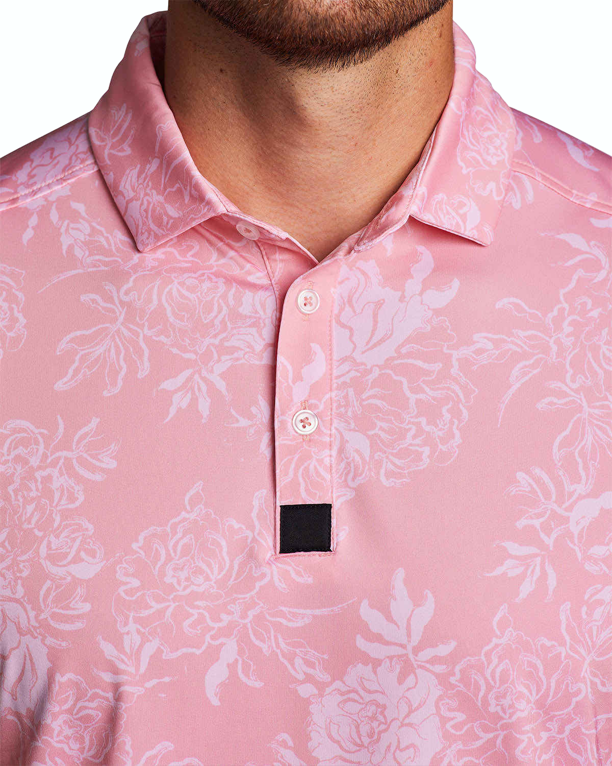 Chemise de golf polo brodée par sublimation avec motif floral.