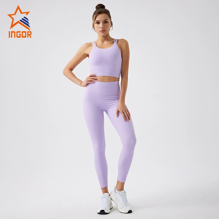 Los fabricantes de ropa de gimnasia deportiva Ingor mujeres Activewear personalizada Deportes Bras y pantalones de yoga Leggings establece desgaste con sostenible reciclado