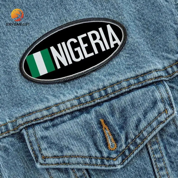 Fábrica de León al por mayor Accesorios de ropa profesional regalo de promoción Embroidery Patches Tela Nigeria Bandera Hierro táctico en parche