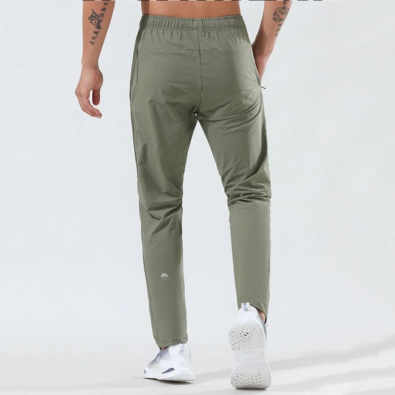 Xsunwing hombres ropa deportiva hombres′ S Moda informal simple pantalones de nueve puntos Pantalones de chándal de running Gym Men′ S pantalones deportivos