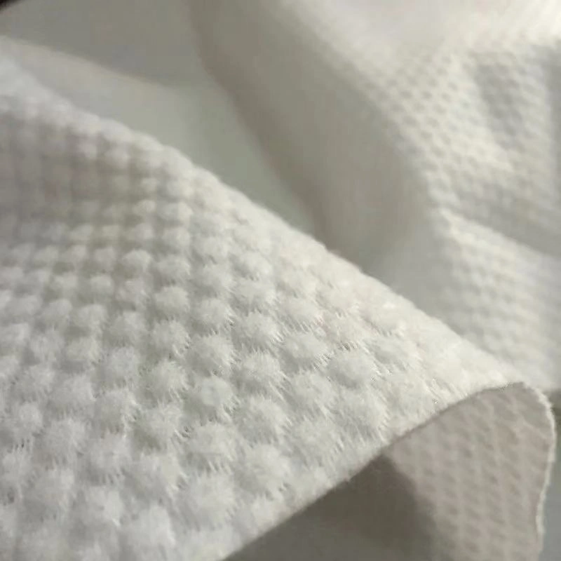 Tissu non tissé Spunlace de haute qualité, parallèle et croisé, pour lingettes humides.