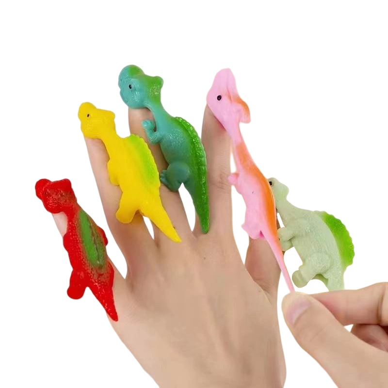 Alivio del estrés de TPR pegajoso volar dinosaurio catapulta Fidget Dedo de goma elástica Flick Dino Animal niños novedad juguetes Slingshot