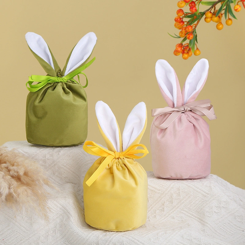 La Pascua Regalos y artesanías de conejito de peluche de caramelos de colores bolsa de regalo en el oído del conejo de chocolate