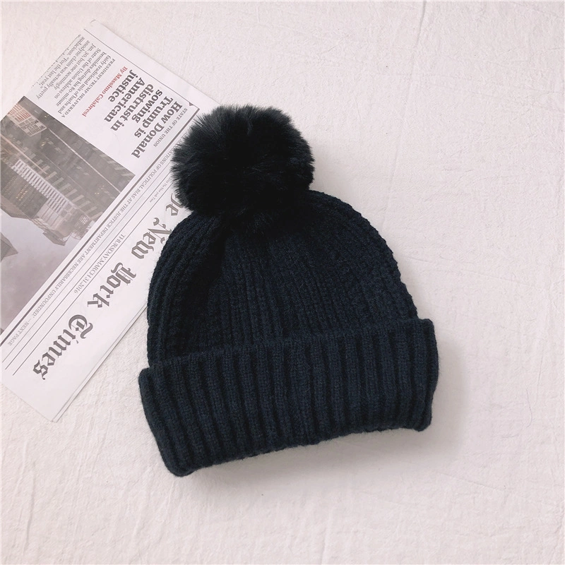 Precio al por mayor mujeres Invierno caliente POM POM gorro de gorro