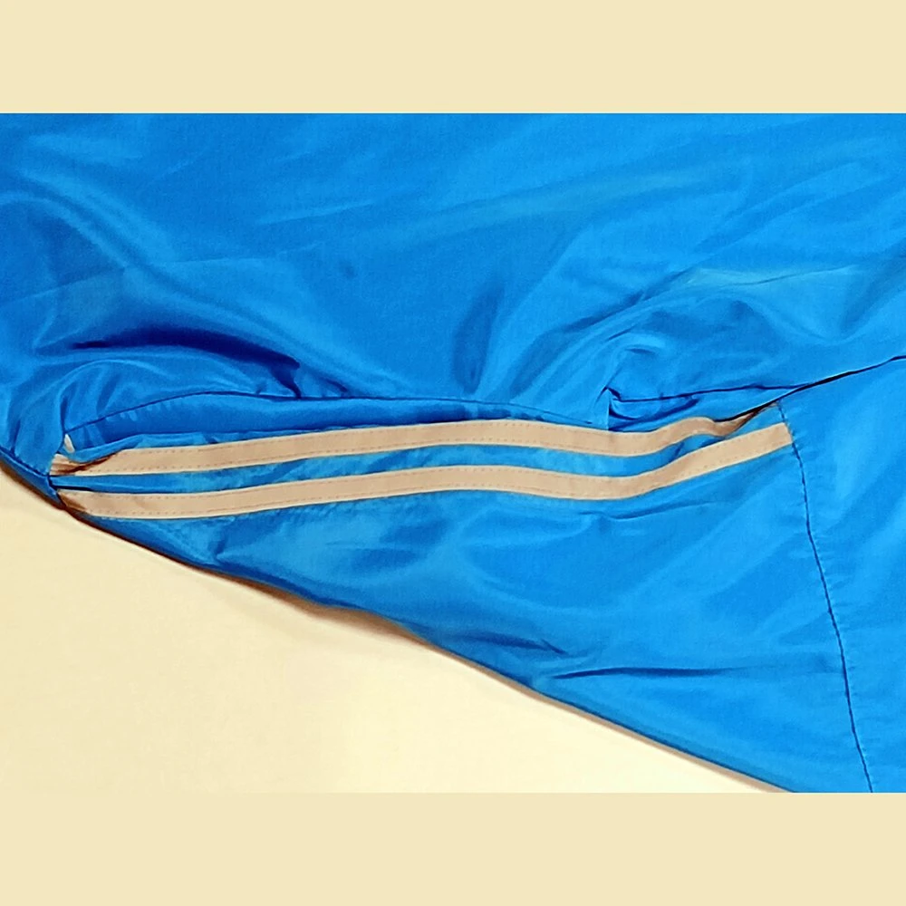 Chaqueta de manga larga con capucha, tira reflectante e impermeable azul