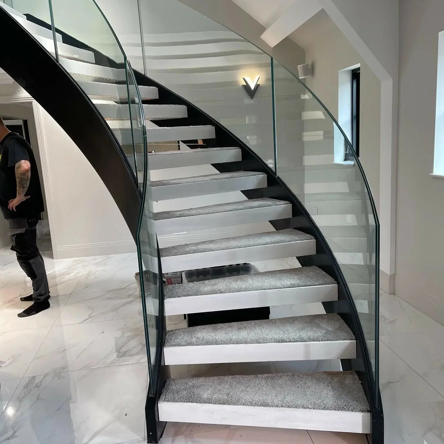 Modern Residential Indoor Marble Curved Staircase Custom Steel Parts Marble Sintered Stone Spiral Stairs