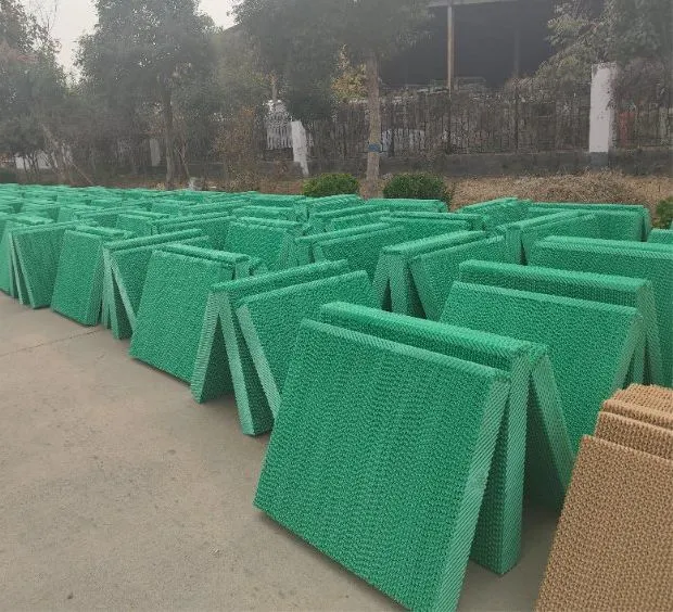 Cooling Pad and Fan Cooling Systems for Greenhouse Poultry House