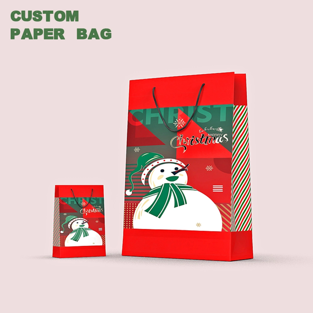 Bolsa de embalaje de cartón a medida Bolsa de regalo con asa Cuerda para la promoción de Navidad Bolsa de compra