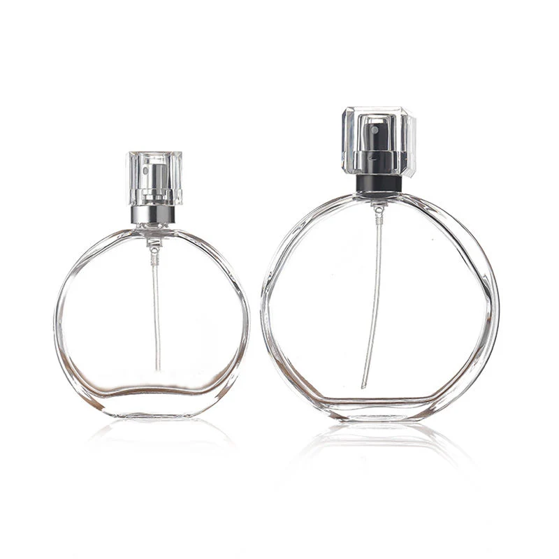 Vente en gros bouteille de parfum rond de luxe de 50 ml 100 ml de haute qualité Flacons en verre de parfum emballage