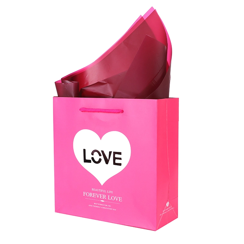 on Sale Stock Paper Gift Bags with Hollow out Love Design