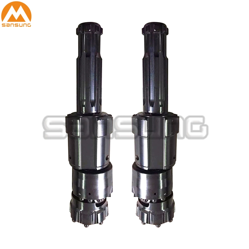 Overburden Casing System Rock Drilling Tools with Pilot Bit, Reamer and Guide Device