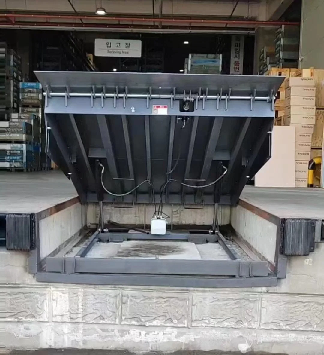 La carga de trabajo pesado carretilla elevadora contenedor de carga de la rampa mecánica de la mesa elevadora parado niveladora
