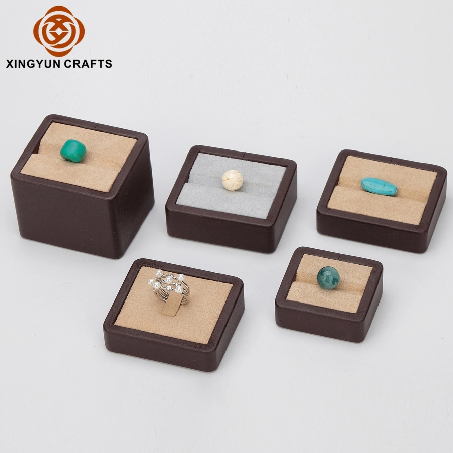 Wholesale China Factory Custom MDF Wrapped with Cream and Brown PU Leather Jewelry Display for Gemstone