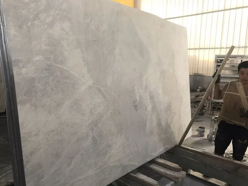 Orina de mármol gris y blanco para pisos de losa