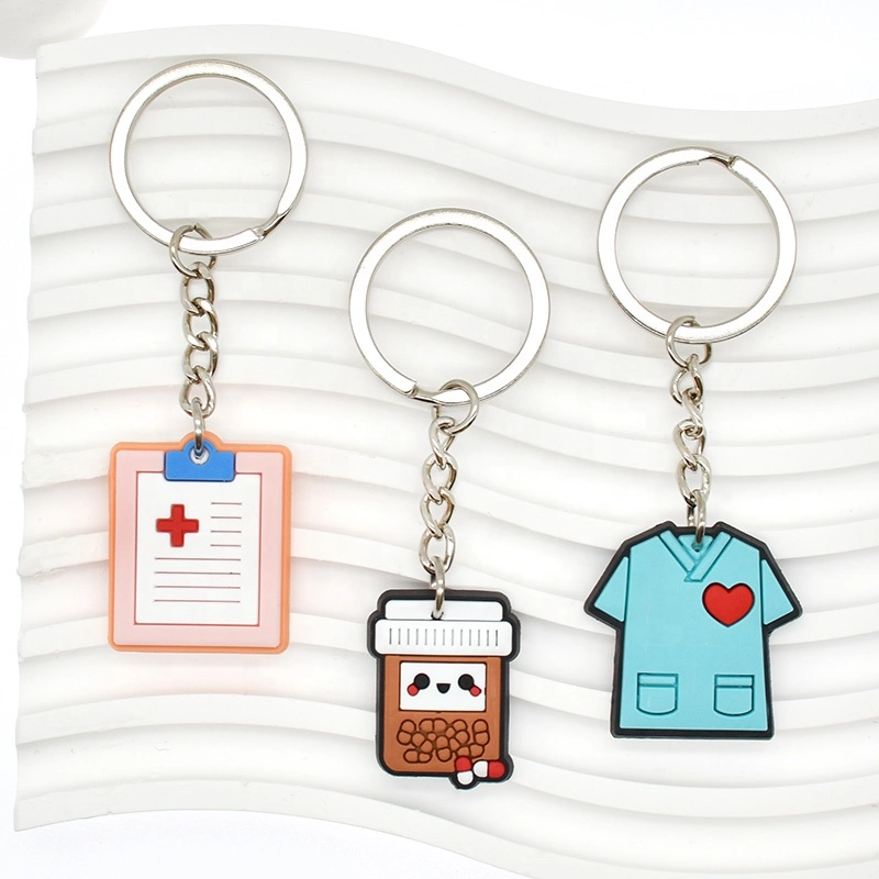 China Fabricante de instrumentos pequeños Accesorios portátil Metal Nurse Keychains clave Cadena con logotipo personalizado