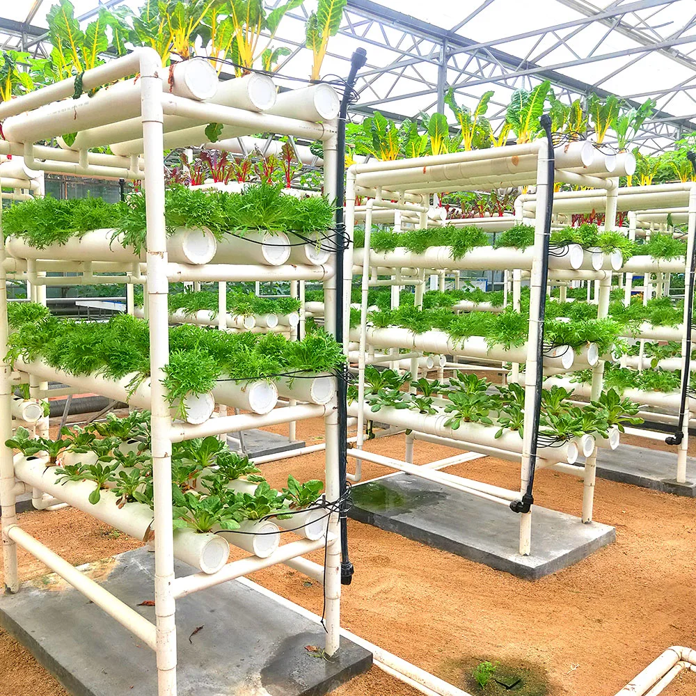 En el interior agrícola vertical del sistema de cultivo hidropónico Nft crecer canal para el jardín de flores de invernadero con caldera de calefacción y ventilador de refrigeración