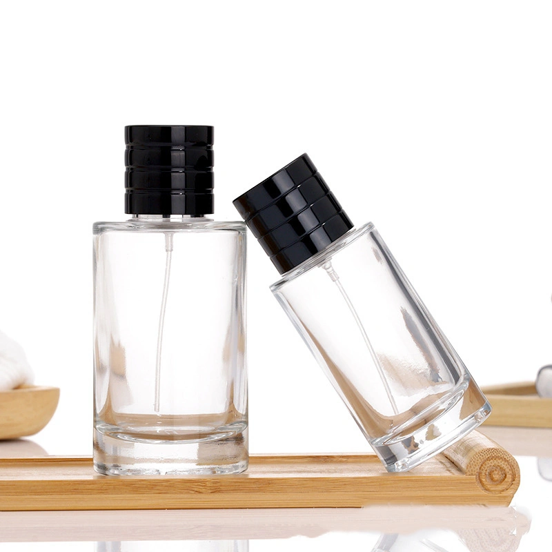 Flacon de parfum en verre transparent, rond et vide, personnalisé 30 ml 50 ml Flacons en verre vaporisateurs de 100 ml avec bouchon