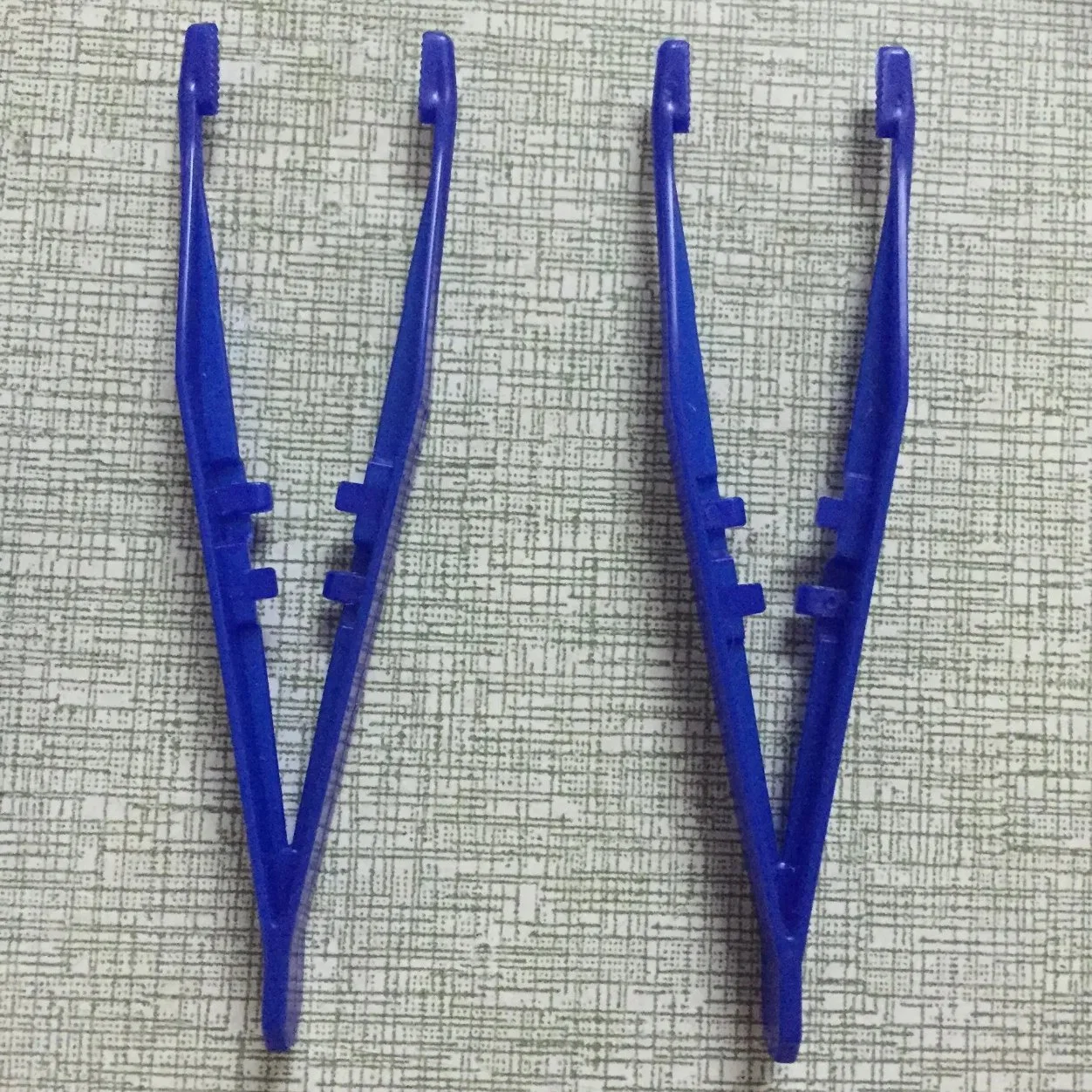 Pinças cirúrgicas estéreis descartáveis pinças cirúrgicas de plástico pinças médicas para uso por grosso