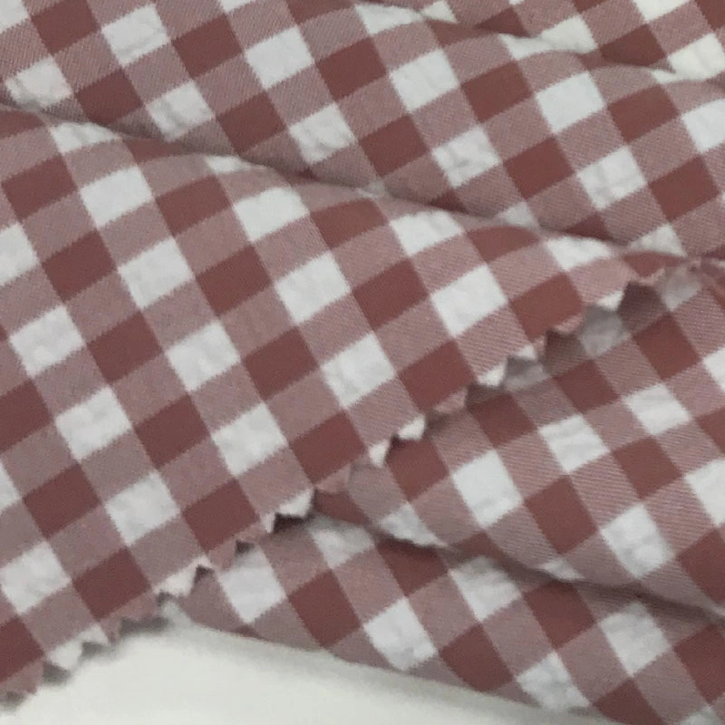 Made in China New Cationic Polyester Elastic Bubble Wrinkle Laid Stripe Fabric Ladies Casual Wear Fabric Spot Wholesale/Supplier