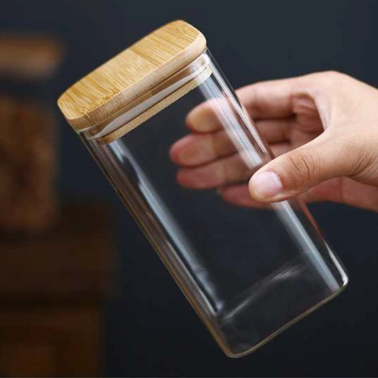 Bocal de rangement en verre borosilicate de gros avec couvercle en bambou. Bocaux de rangement en verre avec couvercle en bois. Contenants de rangement alimentaires.