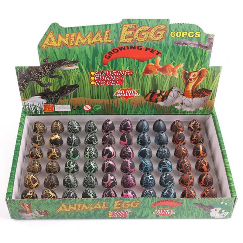 Juguetes educativos al por mayor Regalos Cute Magic pequeño Negro Crack eclosión Añada huevos de dinosaurio en crecimiento de agua para niños