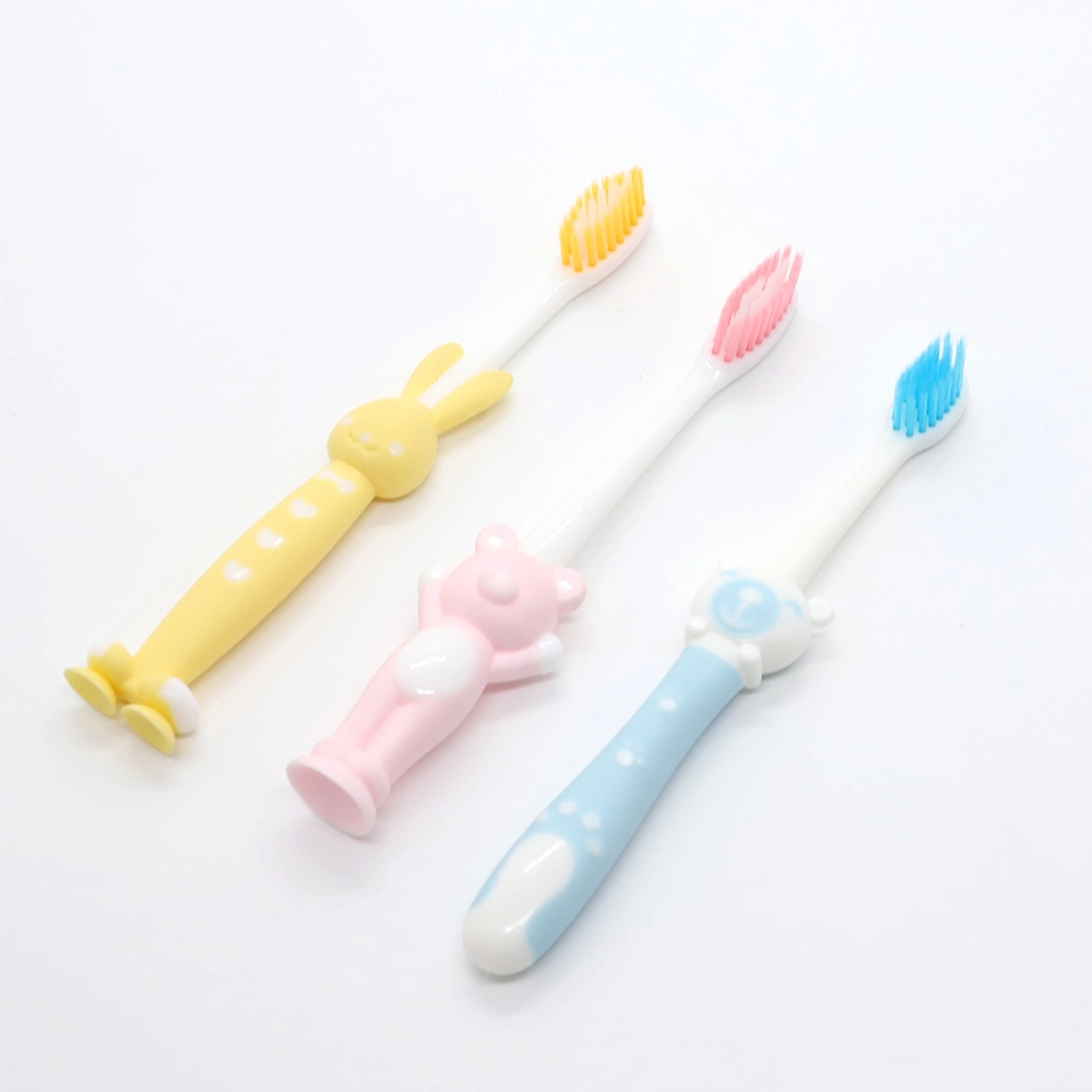 Brosse à dents enfants colorés de haute qualité avec aspiration brosse à dents de bande dessinée OEM