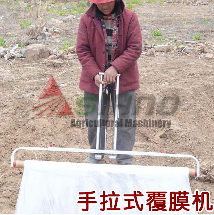 Agricultural Hand Pull Plastic Film Covering Laying Machine/Manual Plastic Mulch Layer Mulching Height 0.5m-2.0m