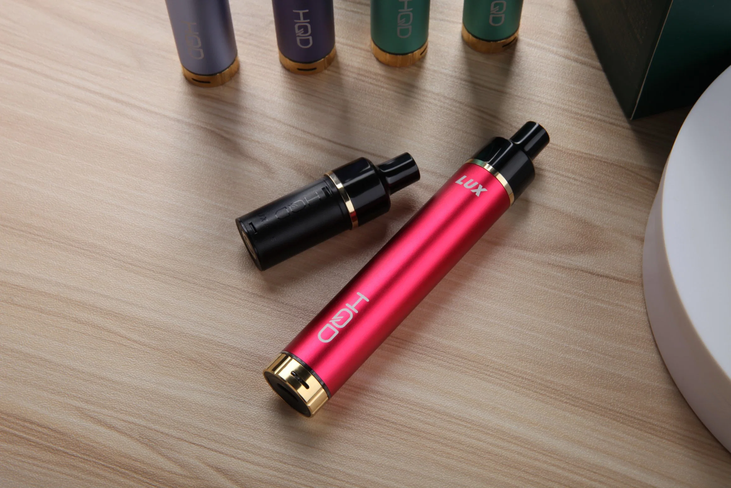 Hqd OEM Factory Price Lux 600/1500puffs Disposable/Chargeable Electronic Cigarette Wholesale/Supplier Disposable/Chargeable Vape