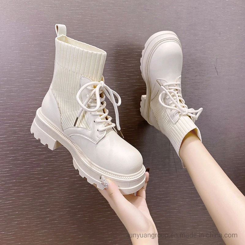 China Manufacturer of Unique Stitching Design Comfortable New Arrivals Fashion Woman Ankle Boots