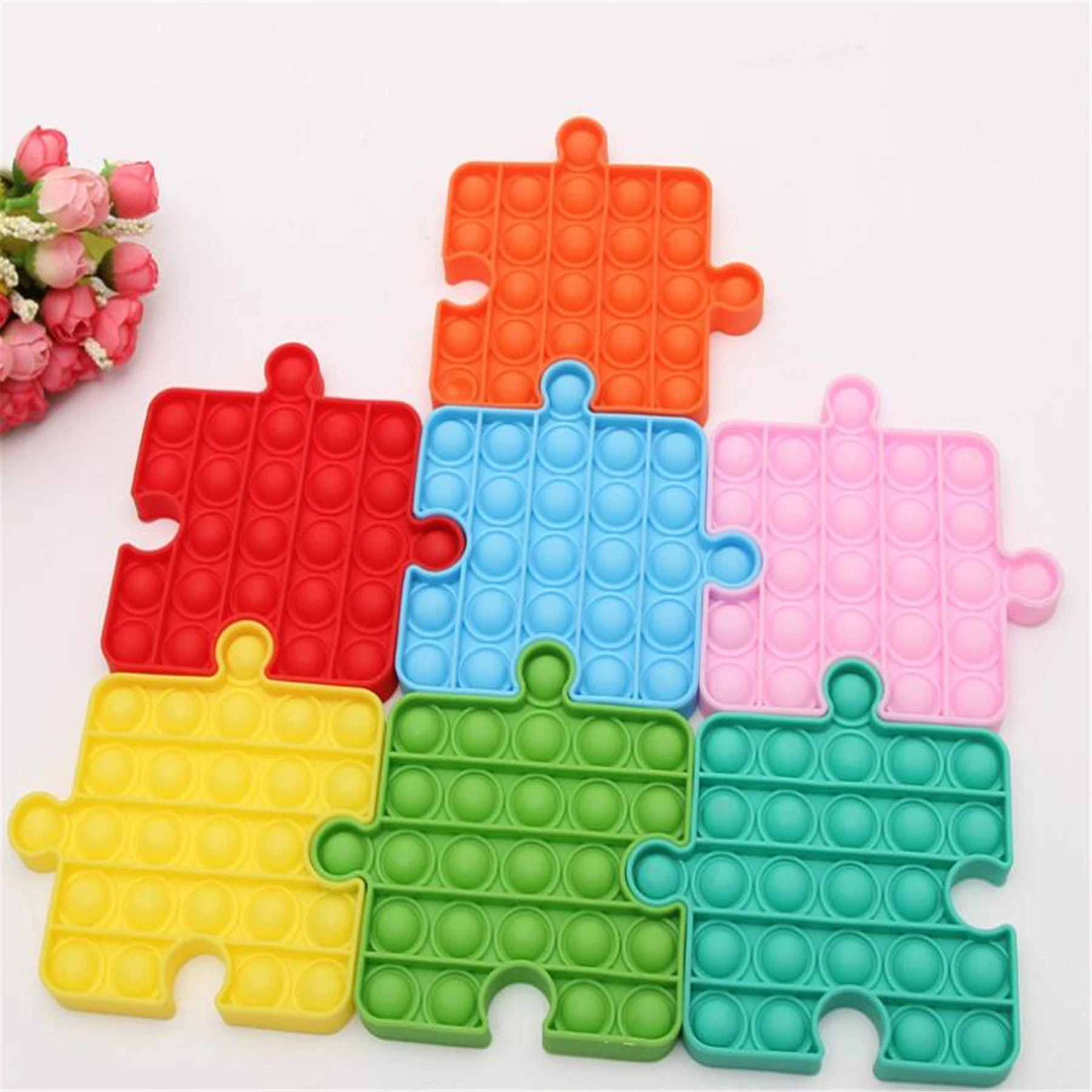 Mayorista/Proveedors últimos juguetes de colores populares burbuja sensorial Tangram Puzzle Push Un fidget