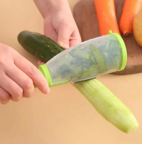 Dispensador de almacenamiento multifuncional pelando la cuchilla con el tubo de almacenamiento pelador de verduras frutas