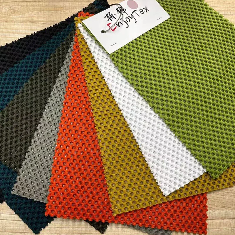 Estofos 3D Honeycomb tecido de malha de poliéster com WR Antistatics Home Cadeira de saco de feijão têxtil Sofá mercado de tecido por grosso