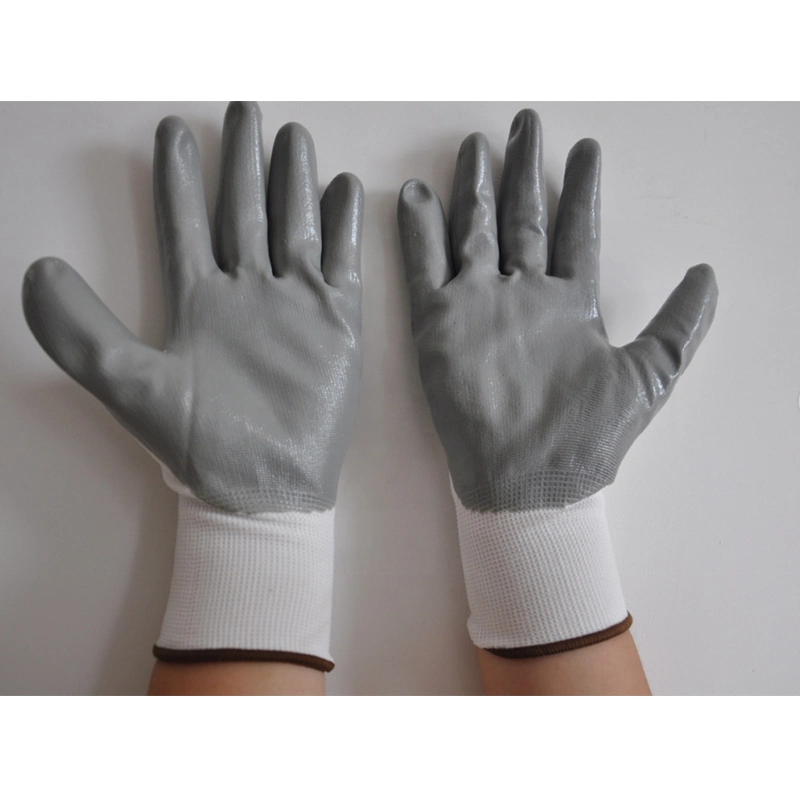 Gants de travail de sécurité en nylon polyester enduits de nitrile avec certification CE en gros bon marché.