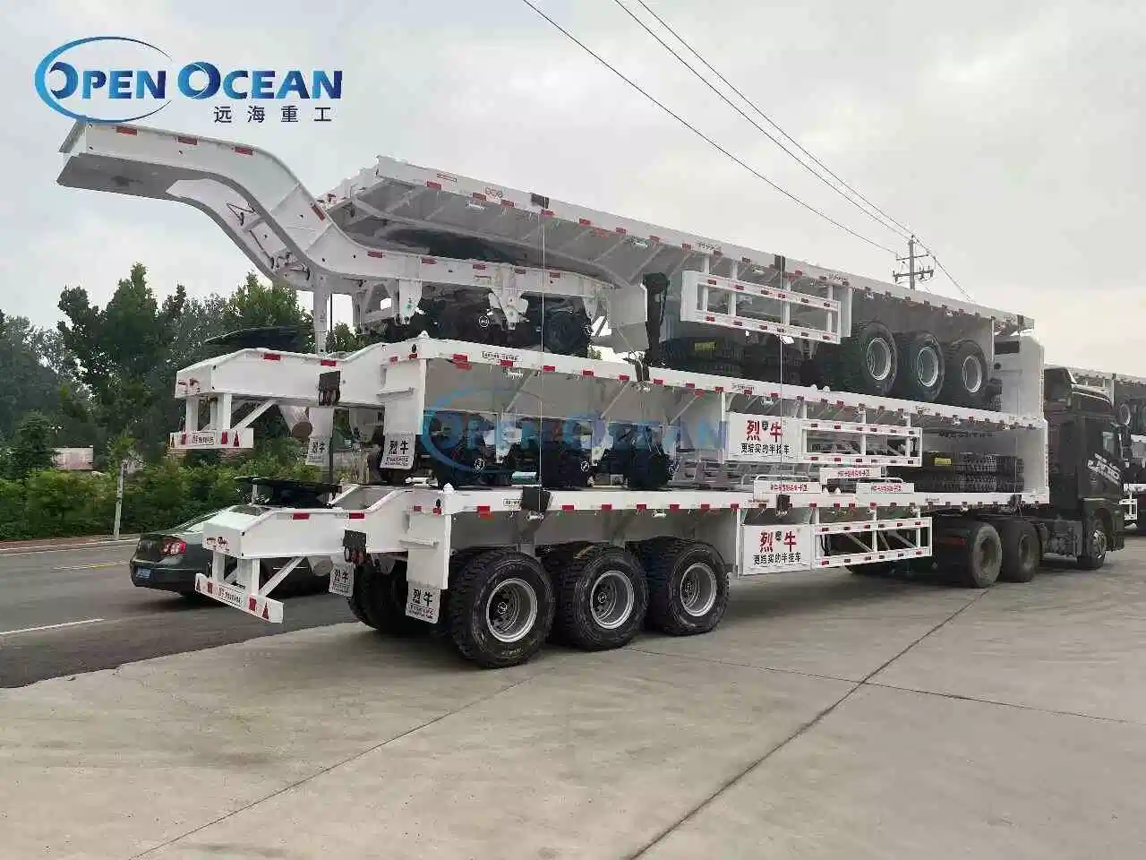 China Hot Sale Factory Price Truck HOWO Shacman 12 Twist Trava Plataforma de plataforma plana 60t Semi 3 eixos 40FT Reboque de contentores plano para pés para venda