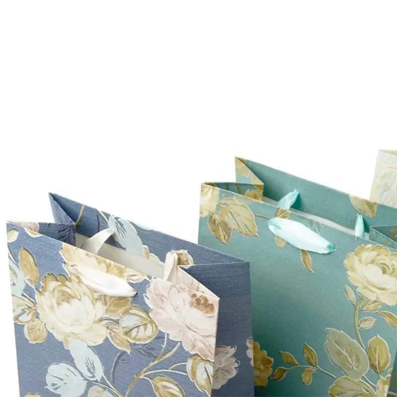 Customised Waxed Bolsas De Papel De Colores DuPont Tyvek Fancy Jewelry Party Gift Paper Bags