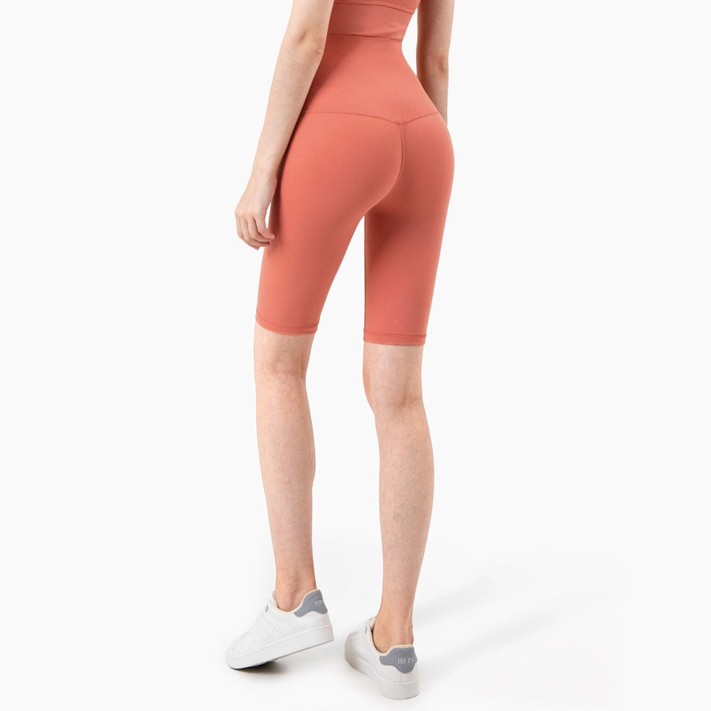 Caliente Vender mujeres pantalones cortos Sexy Fitness Yoga ropa de cintura alta Pantalón corto de gimnasio liso con diseño de but para mujer